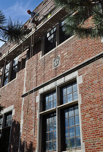 Parapet wall masonry rebuilding company
